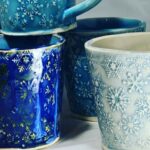 Hand built clay mugs with snowflake texture